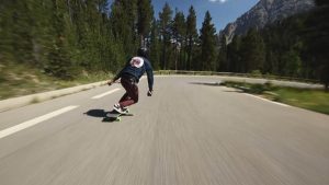 How do you skateboard on a hill