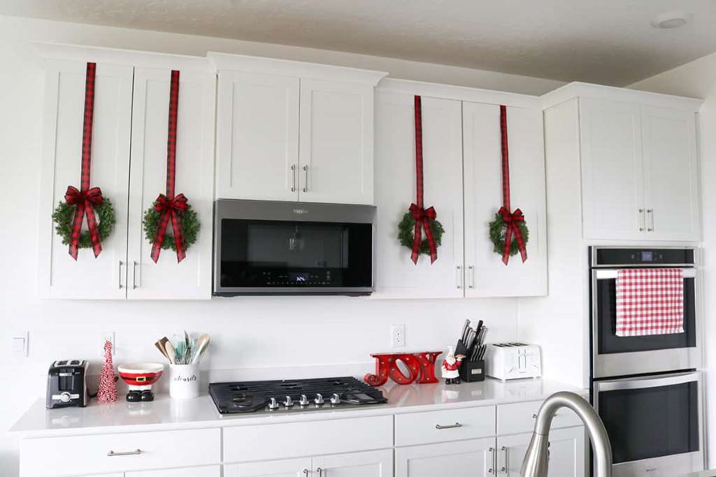 How do you hang wreaths on kitchen cabinets